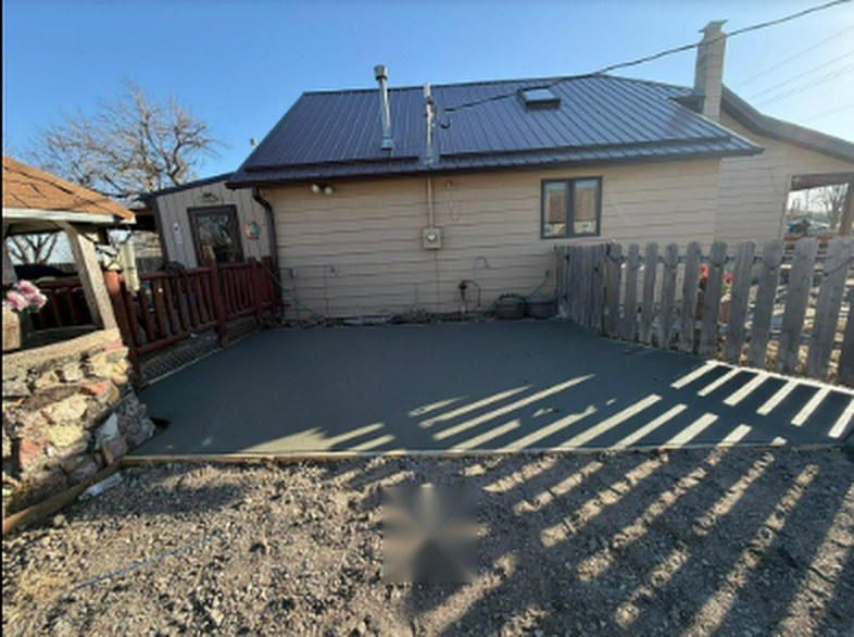 Backyard concrete patio poured by Twins Concrete in Nebraska