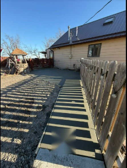 Durable concrete walkway installation by Twins Concrete in Nebraska